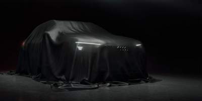 Audi показала изображение электрокроссовера E-Tron